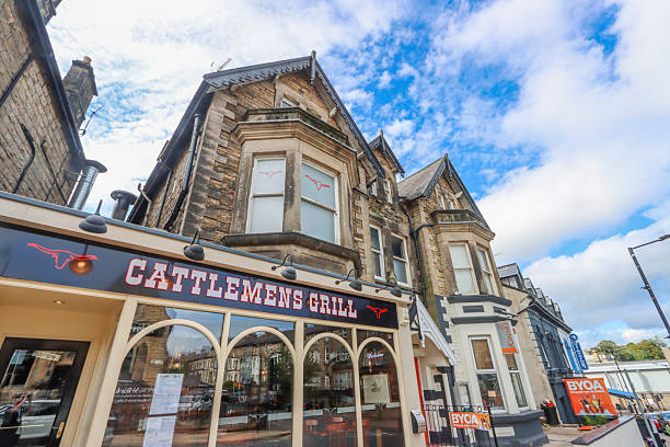 Cattlemen's Grill on Cheltenham Crescent at Harrogate in North Yorkshire, England, with commercial signs visible.