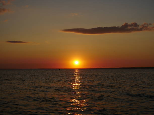 istock orange sun over the horizon red sunset 1459281804