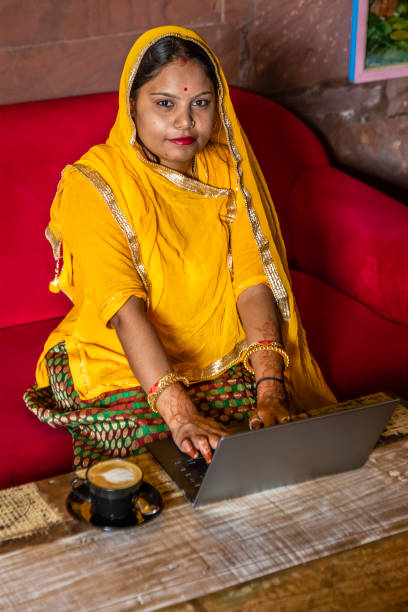 istock Young Indian woman using laptop, Jodhpur, India 1459282223