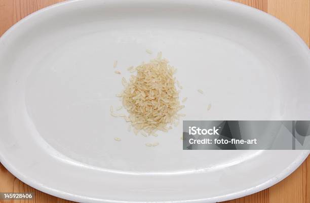 Foto de A Fome e mais fotos de stock de Arroz - Alimento básico - Arroz - Alimento básico, Arroz - Cereal, Arroz Integral