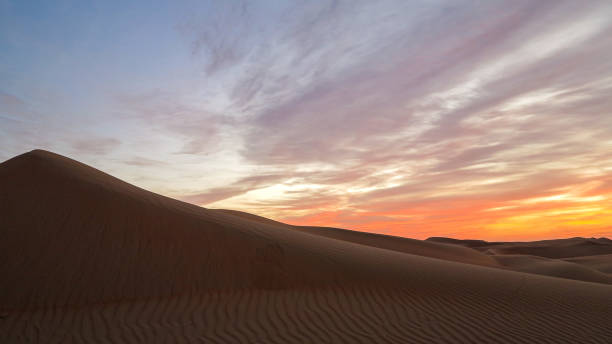 istock Sunset in the empty quarter desert, Abu Dhabi, United Arab Emirates 1459288848