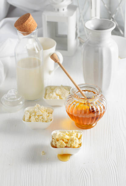 istock Fresh homemade cottage cheese with honey. 1459289651