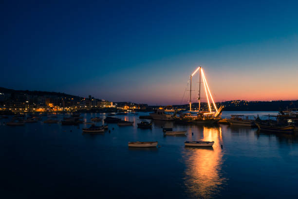 istock Scenic view of a harbor at sunset 1459290349
