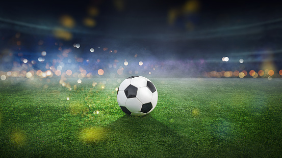 Soccer ball lies on stadium grass in the smoke, 3D Illustration