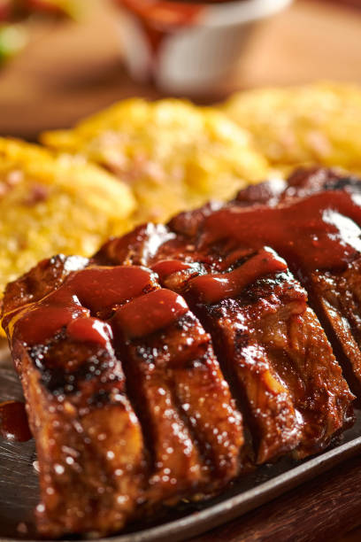 istock Grilled pork ribs with spicy sauce on top 1459290708