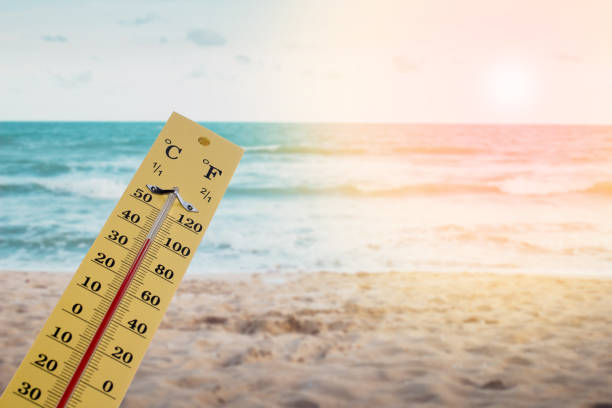 istock Thermometer showing high temperature in summer on the beach 1459290827
