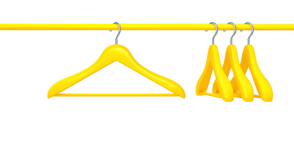 Rack with yellow clothes hangers isolated on white background. 3D rendering