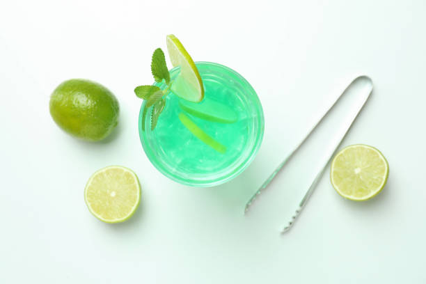 istock Fresh lime cocktail and ingredients on white background 1459297541