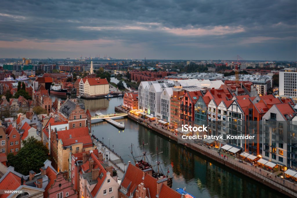 Beautiful Gdansk over the Motlawa river at dusk. Poland Architecture Stock Photo