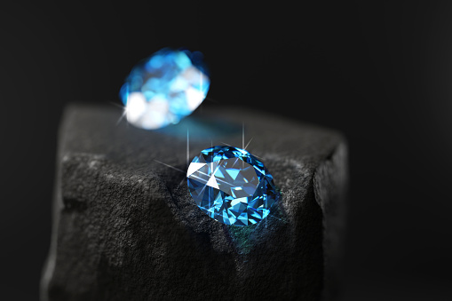 Blue diamond sapphire placed on roughness rock background main object focus 3d rendering
