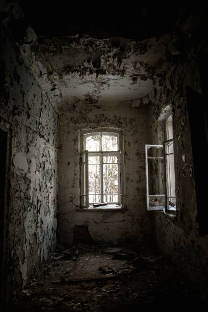 istock Vertical shot of an abandoned old broken building interior 1459302396