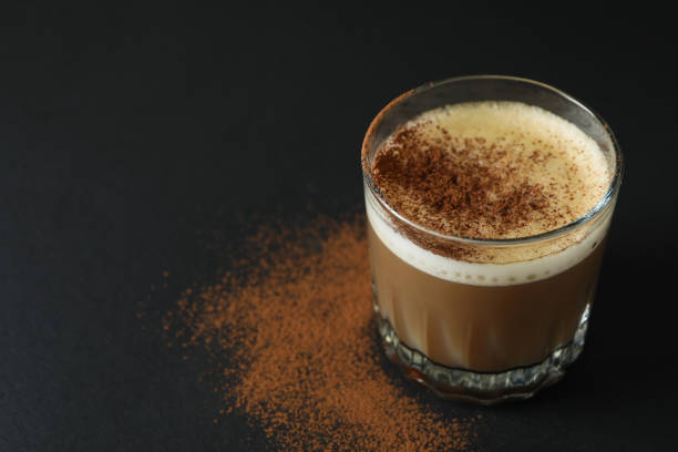 istock Glass of irish coffee on black background 1459303048