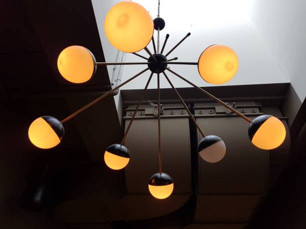 istock Low angle shot of a modern abstract round shape chandelier 1459303399