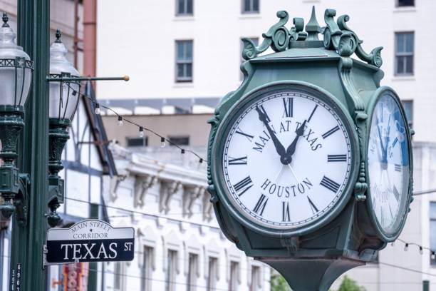 istock Green clock on a street in Downtown Houston, Texas 1459303807