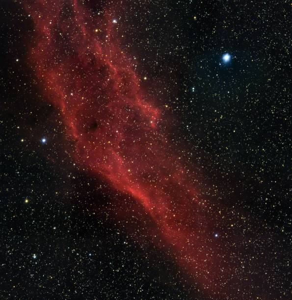 istock Red-colored milky way in the night sky 1459304141
