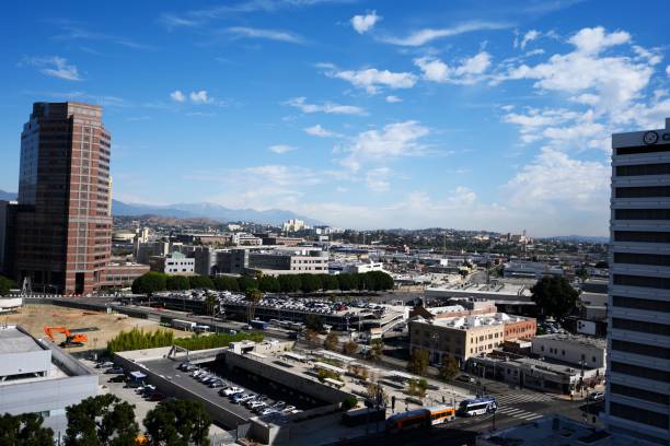 istock Aerial cityscape view surrounded by buildings under blue bright sky 1459305691