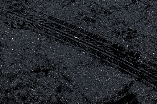 Tire print on asphalt road,Abstract background Tire print on cement road