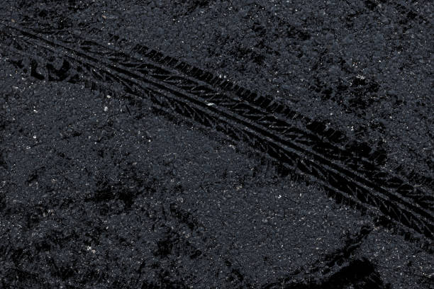 Tire print on asphalt road,Abstract background Tire print on cement road Tire print on asphalt road,Abstract background Tire print on cement road street skid marks stock pictures, royalty-free photos & images