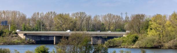 istock Panoramic view of a bridge surrounded by trees 1459307833