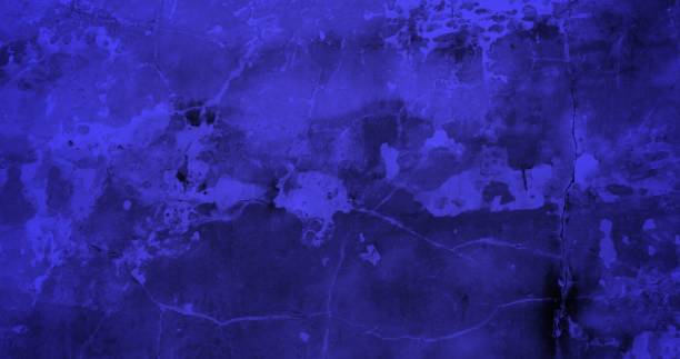 istock Grunge wall with cracks in blue tones for backgrounds and overlays 1459312105