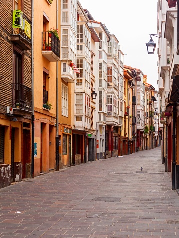 A beautiful narrow alley in Vitoria-Gasteiz, Basque Country, Spain, a vertical shot