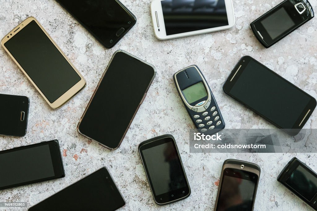 Different Generation Using Phone Different Generations Of Mobile Phone Handsets On Textured Surface ...