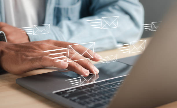 istock Marketing concept. Man with email icon on virtual screen. Direct Selling Program in Email Listing Business. 1459313239