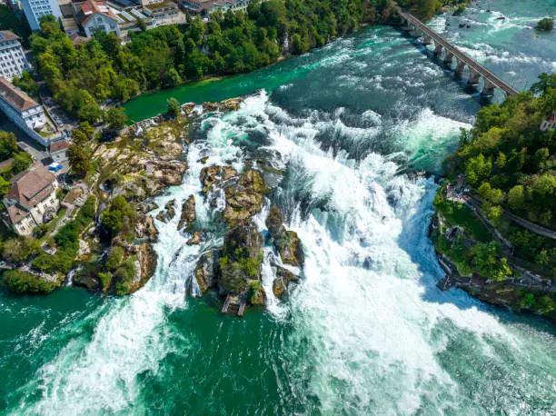 Rhine Falls waterfall in Schaffhausen, Switzerland seen from above. The Rheinfall in the river Rhine is the most powerful waterfall in Europe.