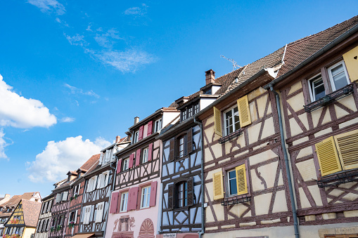 La Petite Venise Colmar city street view in the French Alsace during a summer day. Colmar is famous for its traditional architecture with timber framing in the old town and canals that run through the city. This area is called Little Venice.