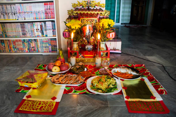 Sacrificial offering for chinese tutelary deity folk religion of taoism Tudigong or Tudishen god lord of soil and ground in shrine in new year at house home on January 21, 2022 in Nonthaburi, Thailand