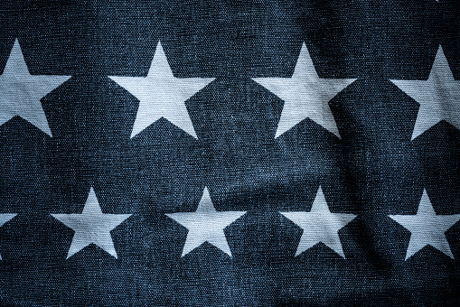 Denim texture with stars pattern close-up