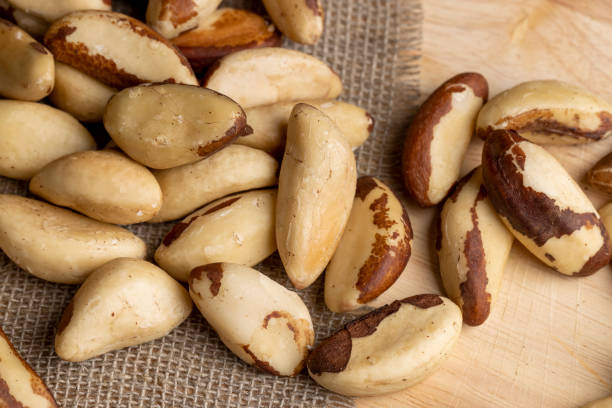 istock High-quality Brazil nuts peeled from the shell on the table 1459322204