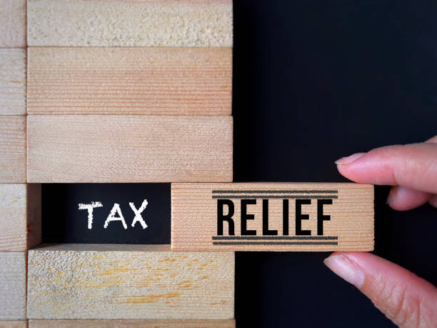 Tax relief text background. Business finance concept.