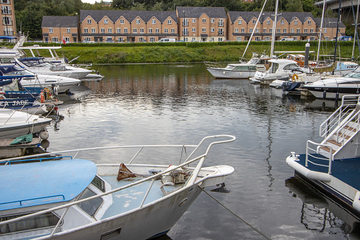 Housing Development at Cardiff Marina in Wales, UK, with private boat names visible.