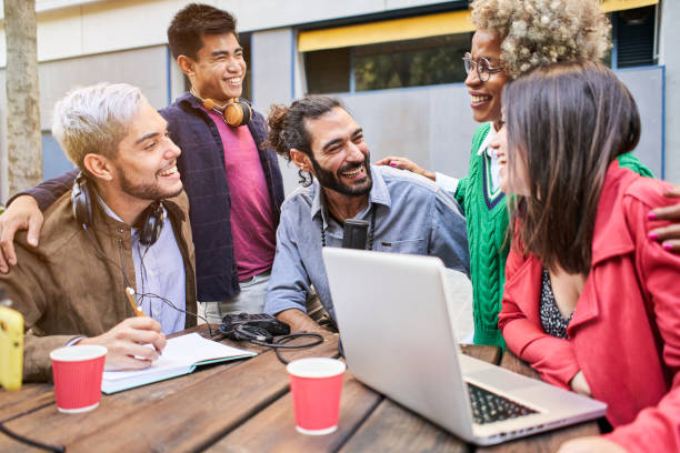 istock Diverse People Studying Students Campus Concept. Colleague Brainstorming togethers using laptop. 1459325133