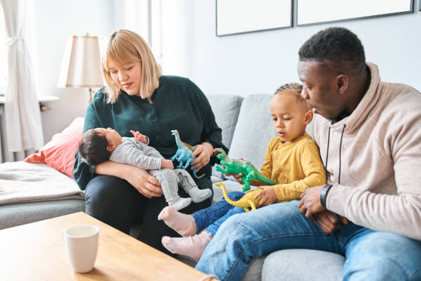 istock Beautiful mixed race family at home 1459325850