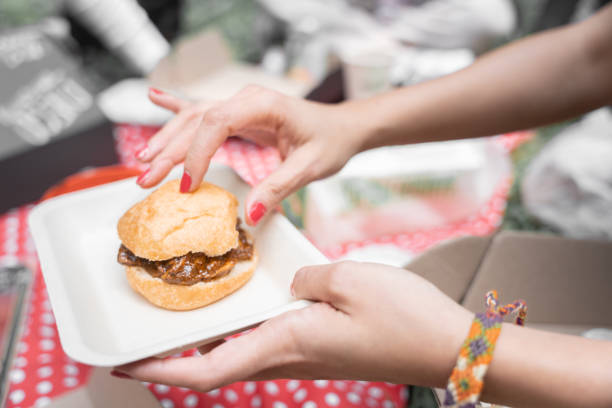 istock A young woman is going to eat a chicken with mole sandwich during a picnic 1459326162