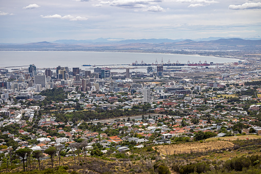 Cape Town, South Africa - December 11th 2022: View over Cape Town under a cloudy sky seen form the side of the Table Mountain