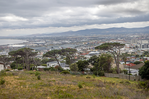 Cape Town, South Africa - December 13th 2022: View over Cape Town under a cloudy sky seen form the side of the Table Mountain