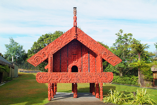 New Zealand, ornated Wataka building - used as storehouse for Maori vilaggers