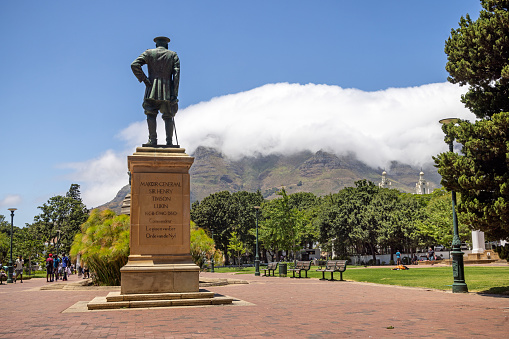 Cape Town, South Africa - December 10th 2022: Statue of Majoor-General Sir Henry Timson Lukin seen from behind against the cloud covered Table Mountain