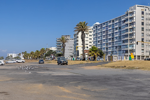 Cape Town, South Africa - December 9th 2022: Residential buildings close to the beach at Sea Point which is a downtown district with a view over the ocean