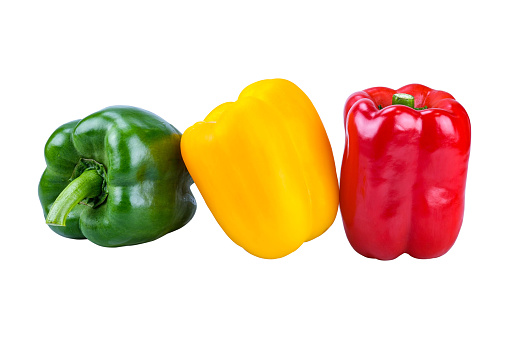Red , green and yellow bell peppers isolated on white background with clipping path