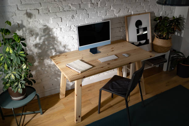 istock Modern office with desktop PC in the apartment. 1459330118