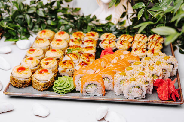 istock Warm Sushi Roll with Salmon, tuna and Cream Cheese 1459331446