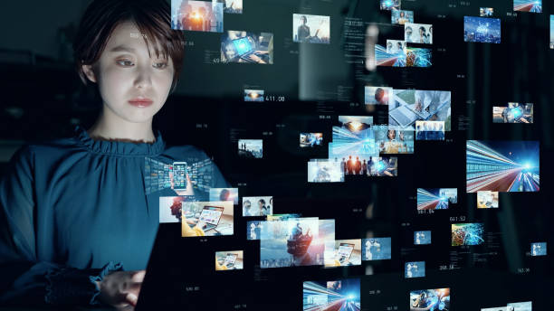 istock Young woman watching various screens. Communication network. 1459336829