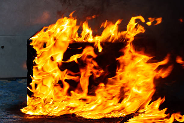 istock microwave oven on fire. the concept of fire in the kitchen. 1459337035
