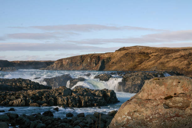 istock River, water crashing against rocks in a natural setting 1459340180