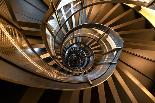 symbol of a modern staircase, spiral staircase inside the building luxury, staircase in villa, wooden spiral staircase, minimalist staircase