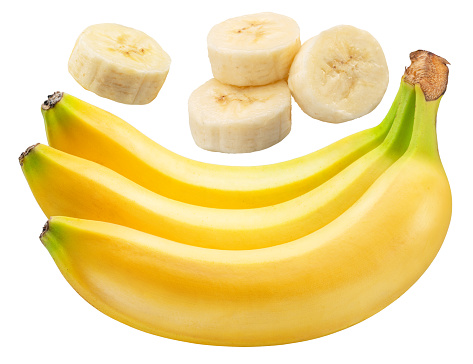 Ripe yellow bananas and cuts of peeled banana on white background. File contains clipping path.